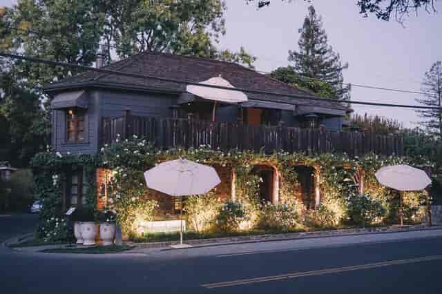 French Laundry outdoor dining, intimate event, floral, romantic