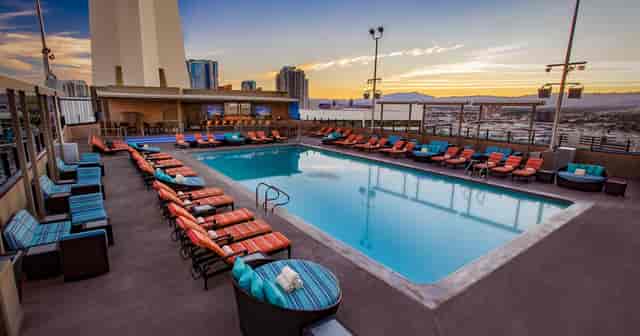 Strat rooftop pool bar evening event