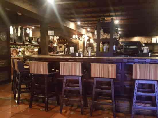 Rustic Casa Juancho bar, upscale reception, VIP event.