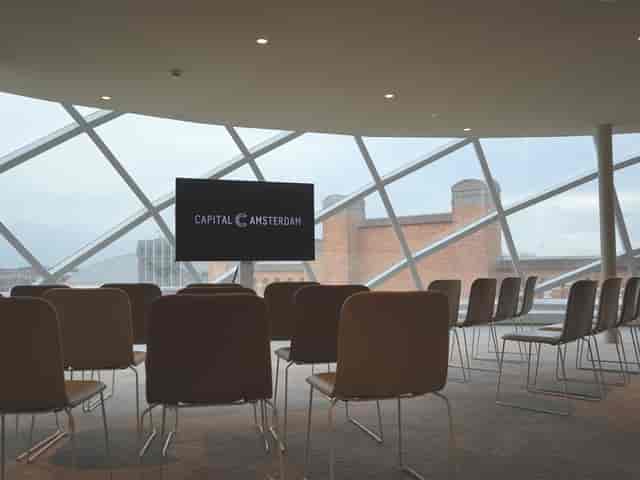 Modern event space in Capital C Amsterdam, ideal for corporate meetings and presentations.