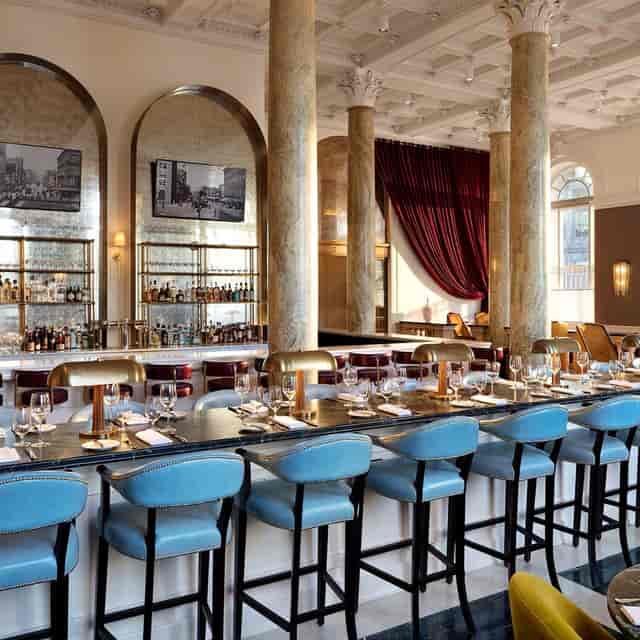 Elegant bar at Café Riggs, perfect for upscale events in Washington DC.