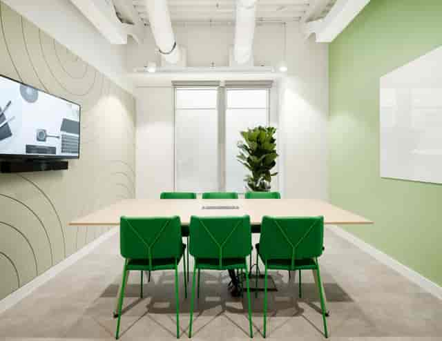 Huckletree Kensington meeting room, green accents, co-working, conference