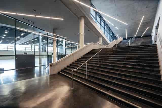 Munich Olympic Hall modern foyer, dramatic staircase, event venue