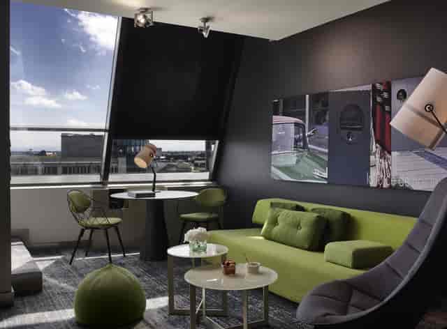 Munich hotel suite city view brainstorm meeting