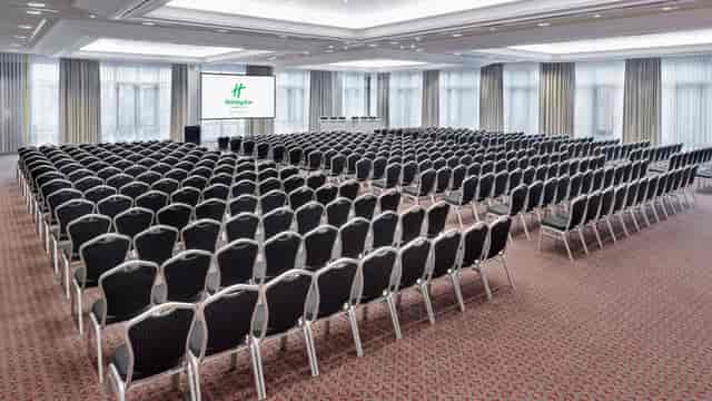 Munich conference ballroom, neutral decor, AV setup, event venue