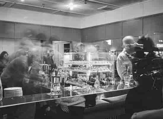 Riva Bar bartender serving cocktails event