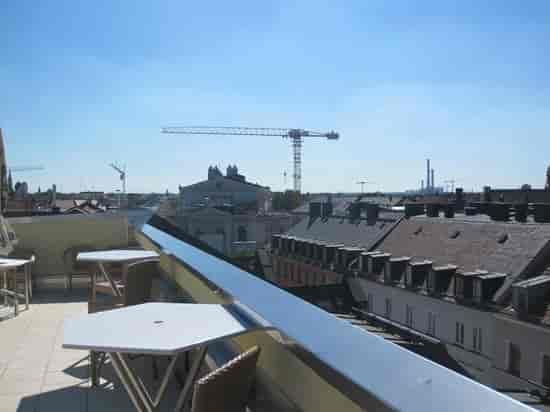 Rooftop terrace cocktail reception, urban venue construction view