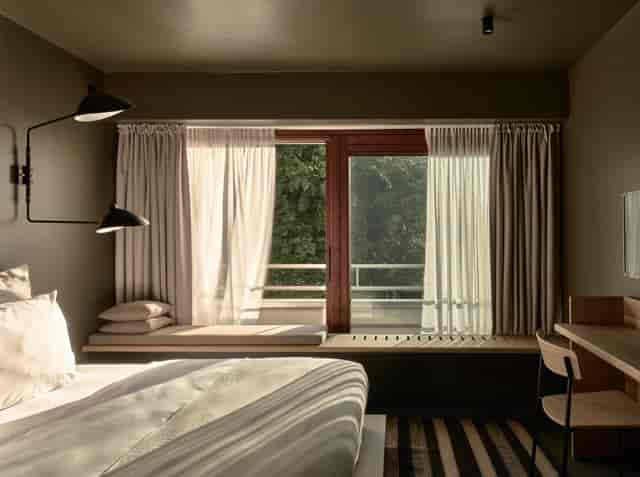 Modern hotel meeting room, window seat, brainstorming retreat