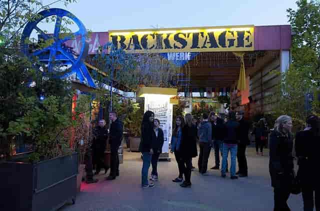Urban venue backstage, industrial chic, event space