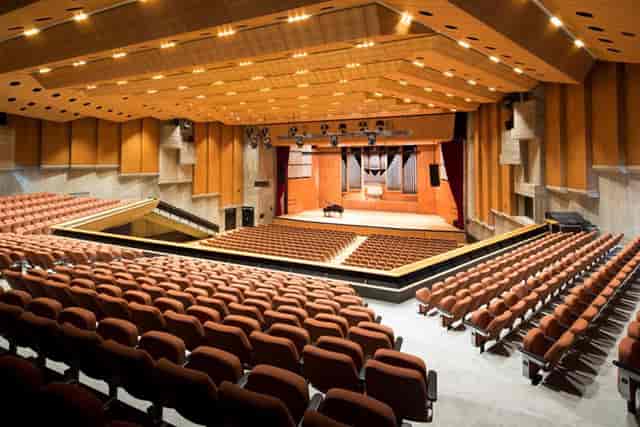 Congress Hall auditorium with wood paneling, ideal for corporate events and keynote presentations.