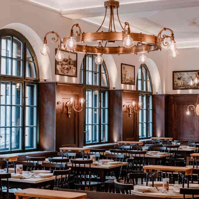 Haxnbauer event venue with wood paneling for corporate dinners and sophisticated networking events.