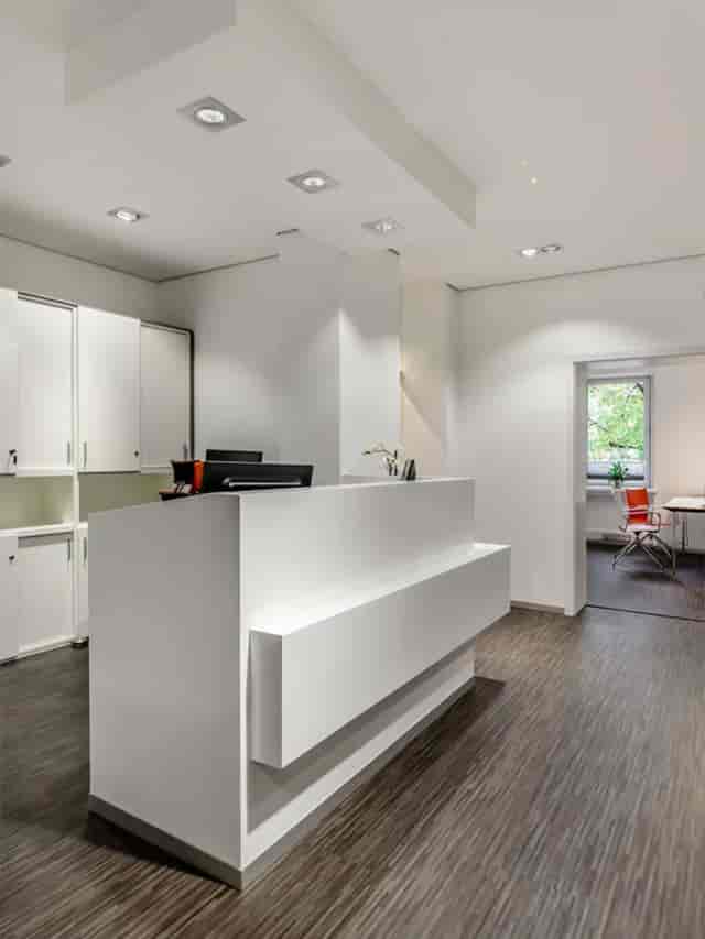 Minimalist registration desk at Prinzregenten 54 for corporate meetings and event check-ins.