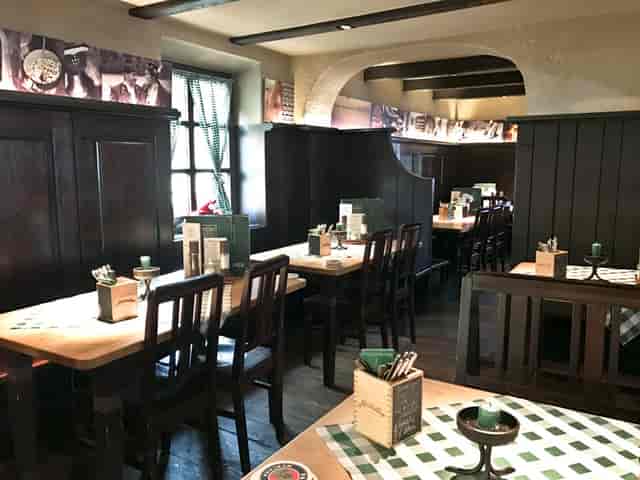 Rustic Wirtshaus zur Brezn dining venue for casual breakout sessions and group events.