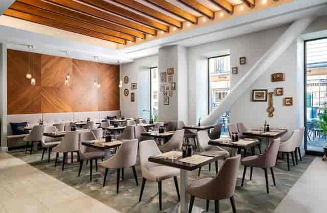 Upscale Hilton Garden Inn Bucharest restaurant for corporate events and professional networking.