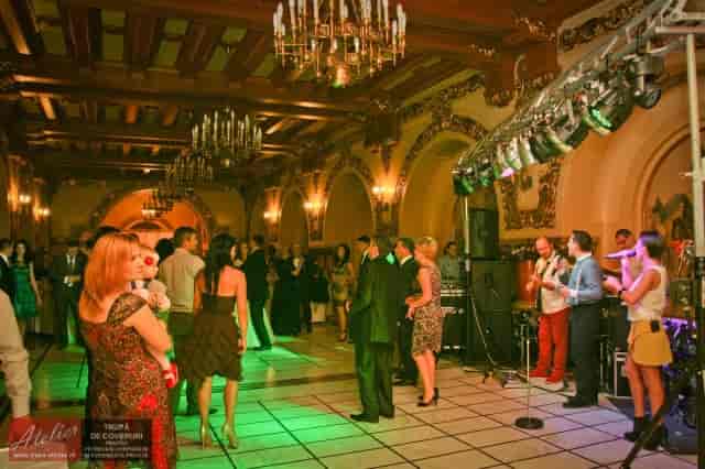 Historic ballroom at Cercul Militar National with modern AV, perfect for elegant corporate events.