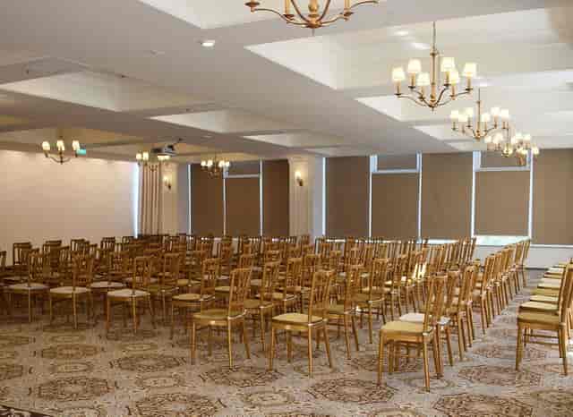 Hotel Minerva ballroom with theater seating for corporate seminars and professional events.