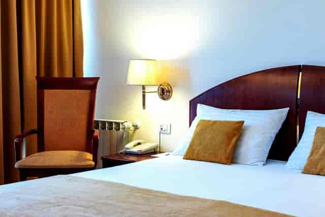 Himalaya Ballroom at Hotel Minerva: Functional corporate event hotel room with workspace.