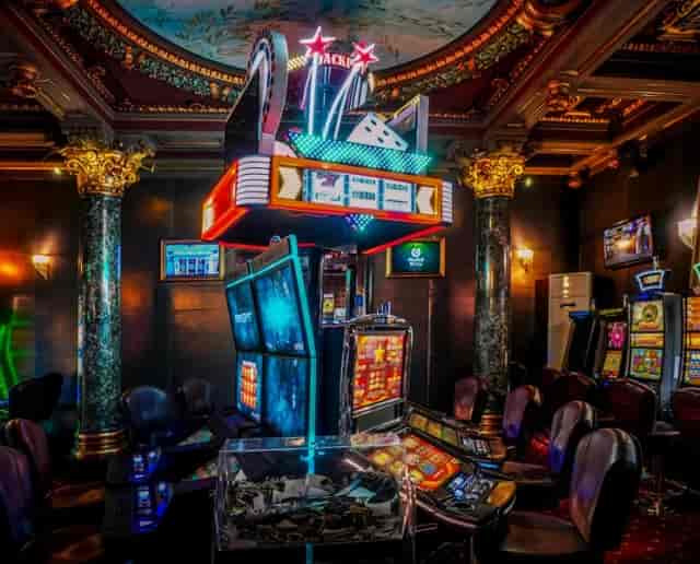 Corporate hospitality event at Palace Casino restaurant with neon lighting and modern decor.