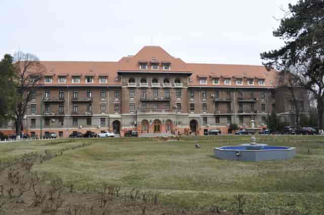 Hotel Triumf historic restaurant venue, grand facade for corporate retreat and academic conference.