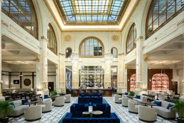 Lobby Bar at CARO Urban Resort with glass ceiling for upscale networking and brand events.