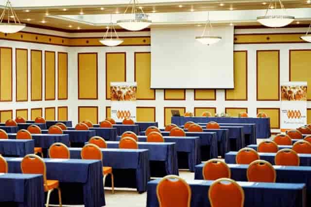 Classroom-style meeting room at CARO Urban Resort for corporate training and presentations.