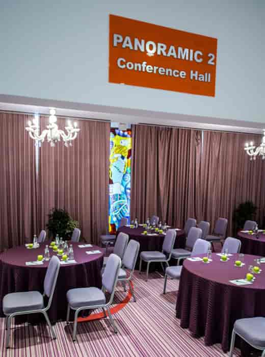 Hotel Marshal Garden banquet room with stained-glass for corporate meetings and events.