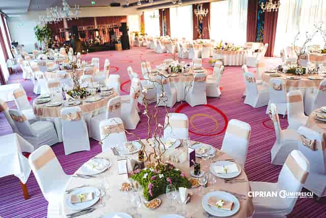 Formal banquet seating with round tables at Marshal Garden Hotel for corporate events or weddings.