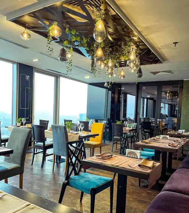18lounge venue with floor-to-ceiling windows, ideal for executive luncheons and private dining.