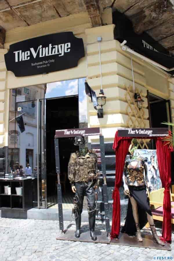 The Vintage pub storefront with red velvet drapery for experiential marketing and brand activation.