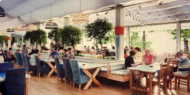 Outdoor restaurant terrace for corporate networking reception and luncheon.