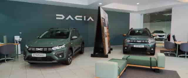 Dacia Auto Cobălcescu showroom with open lounge layout for automotive events and product launches.