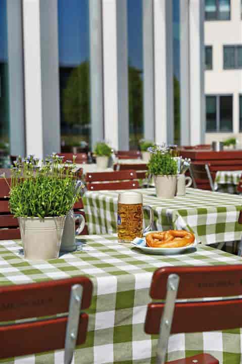 Leopold beer garden, Bavarian tables: informal breakout session, conference networking venue.