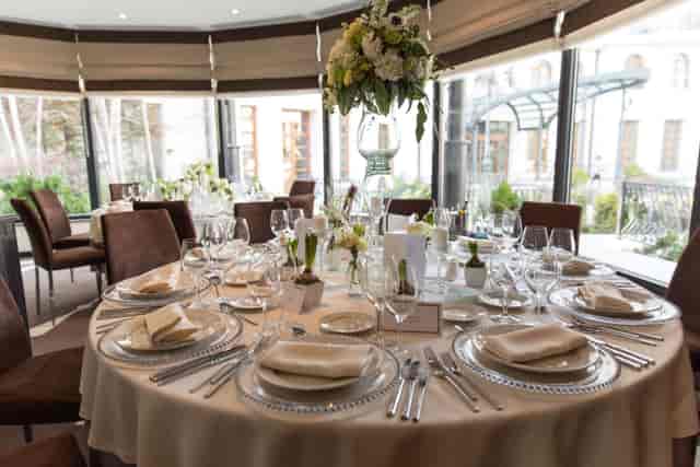 Elegant dining table set for weddings or corporate galas at Epoque Hotel.