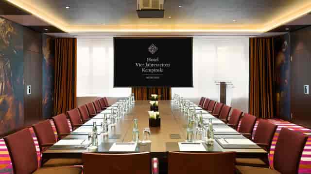 Elegant conference room at Hotel Vier Jahreszeiten, perfect for meetings and corporate events.