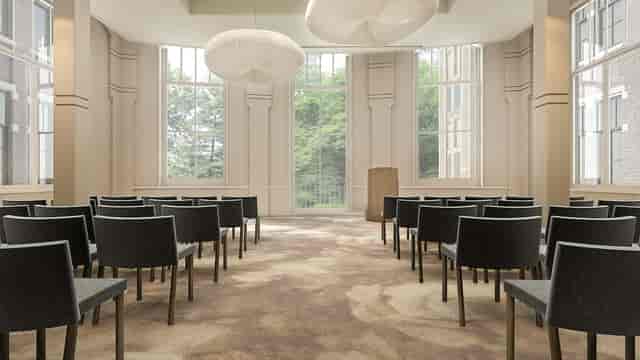 J.B. Springer Salon meeting space with floor-to-ceiling windows for corporate events and workshops.