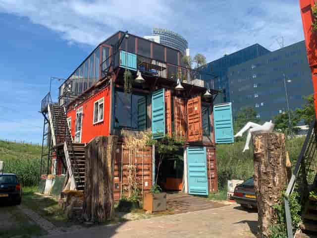 Industrial-chic shipping container loft for creative workshops and brand activations.