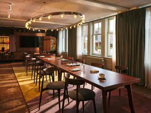 Salotto boardroom at The Hoxton Amsterdam with natural light for executive meetings and workshops.