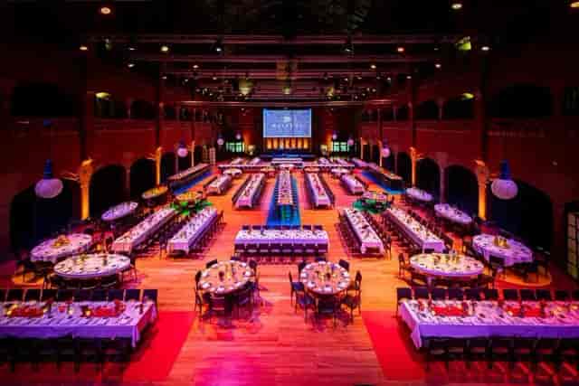 Gala setup at Pearl Ballroom Amsterdam: historic venue with banquet tables and stage.