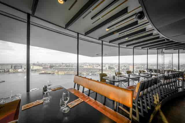 Skybar Madam Amsterdam: VIP reception venue with panoramic skyline views for corporate events.