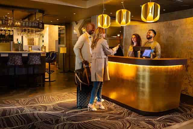 Luxury hotel lobby with reception for VIP corporate events and conference arrivals.