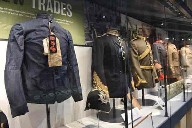 Historical uniforms in RLC Museum meeting room for corporate event and networking venue.