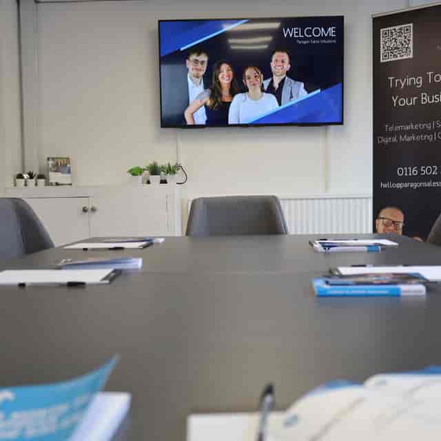 Paragon Creative Studios boardroom with branded signage for corporate events and professional meetings.