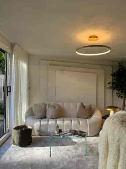 KO LAB Studios boutique breakout space with textured seating for VIP consultations and wellness.
