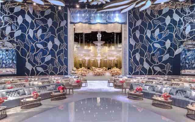 Luxury gala ballroom at Festival Arena Dubai with elegant lounge seating and dramatic lighting.