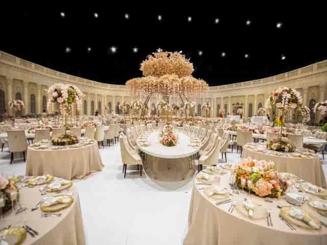 Luxury gala with oversized floral decor at Festival Arena Dubai event venue.