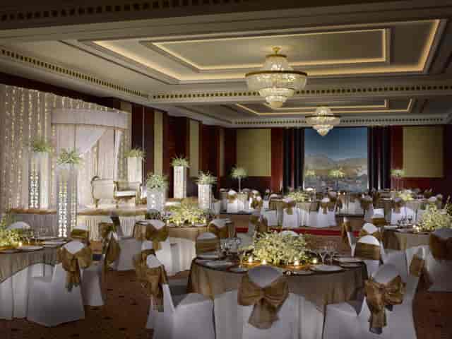 Luxury ballroom in Meeting Room 6, Dusit Thani Dubai, featuring elegant gold accents for events.