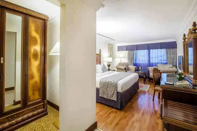 Grand Excelsior Hotel Bur Dubai executive suite with seating area for VIP business travel.
