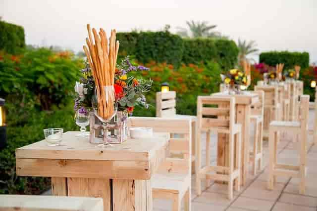 Rustic pallet furniture at an Aquaviva outdoor networking event, Address Montgomerie.