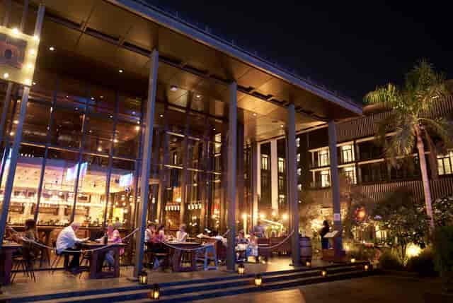 Grapeskin wine bar with ambient lighting, perfect for executive networking and evening receptions.
