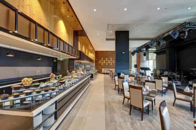 Buffet dining area at Metropolitan Hotel Dubai for corporate events and business meetings.